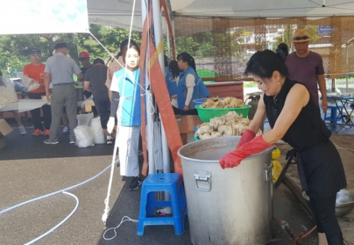 폭염보다 더 뜨거운 봉사자들의 열정